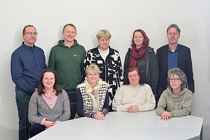 Photo: Representative body for the severely disabled 

[Discription: Group photo of the nine members of the Representative Council for 
Severely Disabled Persons in front of a white background. They look friendly into 
the camera. Four people are sitting at a table, five people are standing behind 
them.]